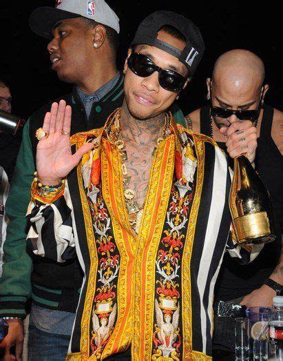 rap artist wearing versace glasses|10 Rap Artists Who Are Inseparable From Their .